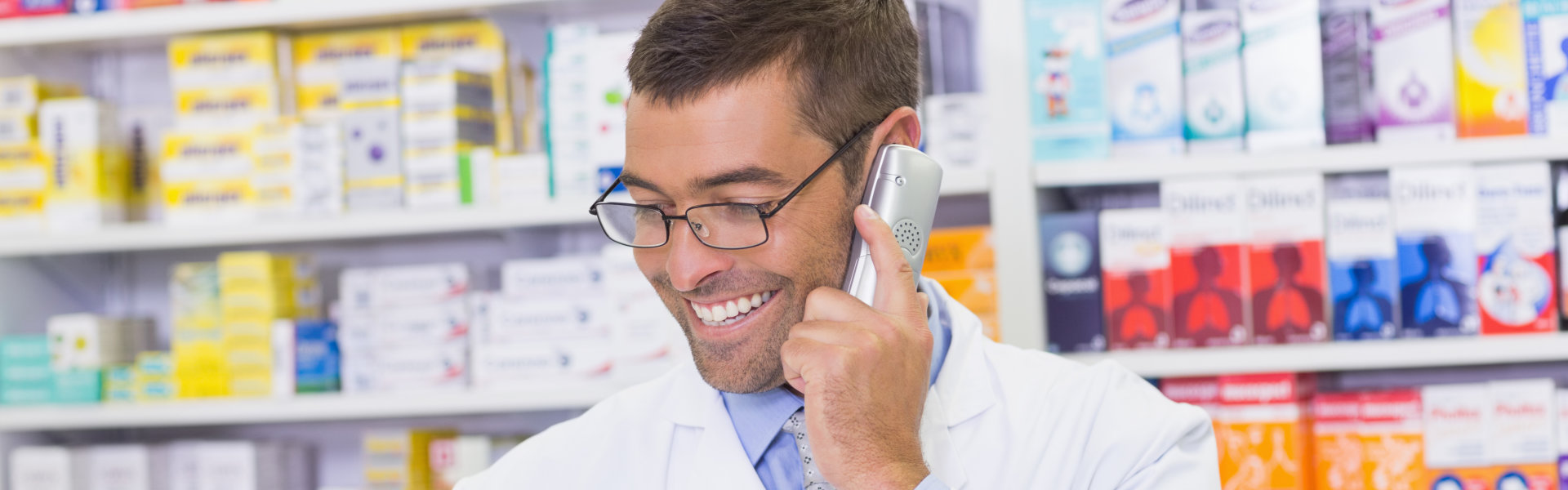 pharmacist talking to someone on the phone